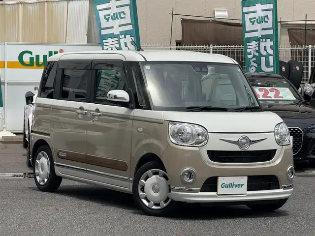ダイハツ ムーヴ キャンバス X メイクアップ リミテッド SAⅢ 愛知県 2019(平31)年 2.8万km パールホワイトⅢ/ナチュラルベージュマイカメタリック 2トーン /禁煙車//Relax　style//ウッド調デカールパック//ピンストライプ/サイドストライプ/リアバンパーストライプ//フューエルリッドガーニッシュ//社外ナビ//フルセグ/Bluetooth/CD/DVD/SD/MSV/ラジオ//パノラマモニター//両側パワースライドドア//スマートアシストIII//衝突回避支援ブレーキ機能//衝突警報機能//前方後方誤発進抑制制御機能//車線逸脱警報機能//先行車発進お知らせ機能//オートハイビーム//オートヘッドライト//ヘッドライトレベライザー//フォグランプ//プッシュスタート//スペアスマートキー//オートリトラクタブルミラー//VSC＆TRC//ヒルホールドシステム//アイドリングストップ//革巻きステアリング//ステアリモコン//チルトハンドル//フロアマット//後席置きラクボックス//スーパーUV＆IRカットガラス//保証書//取扱説明書//ナビ取扱説明書//点検整備記録簿R2.3.4