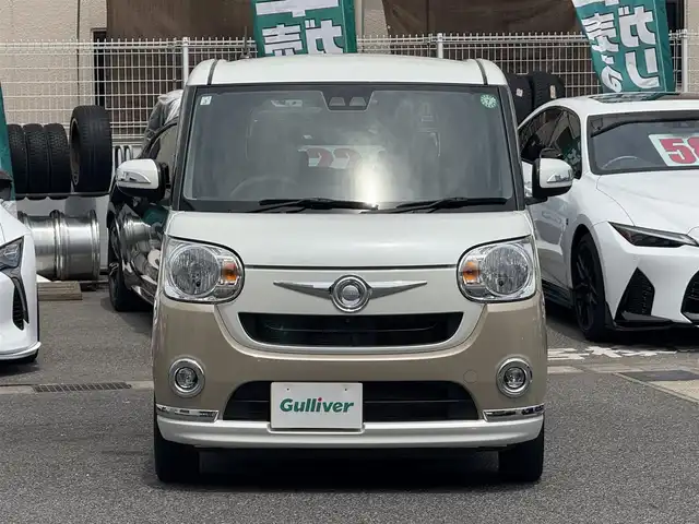 ダイハツ ムーヴ キャンバス X メイクアップ リミテッド SAⅢ 愛知県 2019(平31)年 2.8万km パールホワイトⅢ/ナチュラルベージュマイカメタリック 2トーン /禁煙車//Relax　style//ウッド調デカールパック//ピンストライプ/サイドストライプ/リアバンパーストライプ//フューエルリッドガーニッシュ//社外ナビ//フルセグ/Bluetooth/CD/DVD/SD/MSV/ラジオ//パノラマモニター//両側パワースライドドア//スマートアシストIII//衝突回避支援ブレーキ機能//衝突警報機能//前方後方誤発進抑制制御機能//車線逸脱警報機能//先行車発進お知らせ機能//オートハイビーム//オートヘッドライト//ヘッドライトレベライザー//フォグランプ//プッシュスタート//スペアスマートキー//オートリトラクタブルミラー//VSC＆TRC//ヒルホールドシステム//アイドリングストップ//革巻きステアリング//ステアリモコン//チルトハンドル//フロアマット//後席置きラクボックス//スーパーUV＆IRカットガラス//保証書//取扱説明書//ナビ取扱説明書//点検整備記録簿R2.3.4