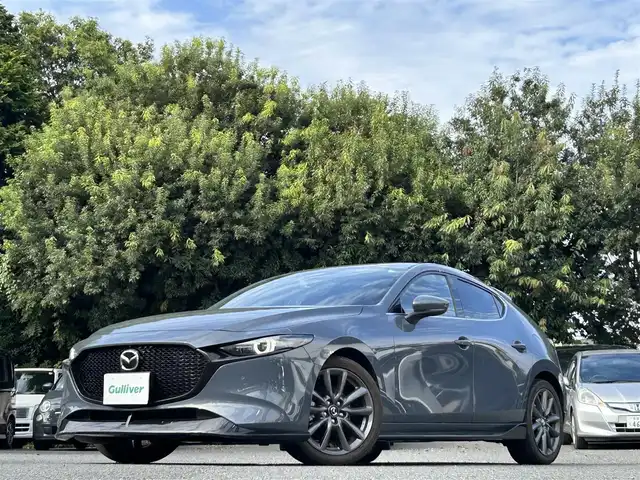マツダ マツダ３ファストバック 20S プロアクティブ ツーリングS 東京都 2021(令3)年 4.1万km ポリメタルグレーM ワンオーナー/純正SDナビ（8.8インチ）/・Bluetoothオーディオ/USBオーディオ/・Apple CarPlay/AndroidAuto/・フルセグTV/DVD/HDMI/360度セーフティパッケージ/・360度ビューモニター/ドライバーモニタリング/純正エアロ/・フロントアンダースカート/リアルーフスポイラー/・サイドアンダースカート/リアアンダースカート/パワーシート（運転席）/シートヒーター（前席）/レーダークルーズコントロール/クルージングトラフィックサポート/ブラインドスポットモニタリング/純正ビルトインETC/取扱説明書/保証書/スペアキー1本