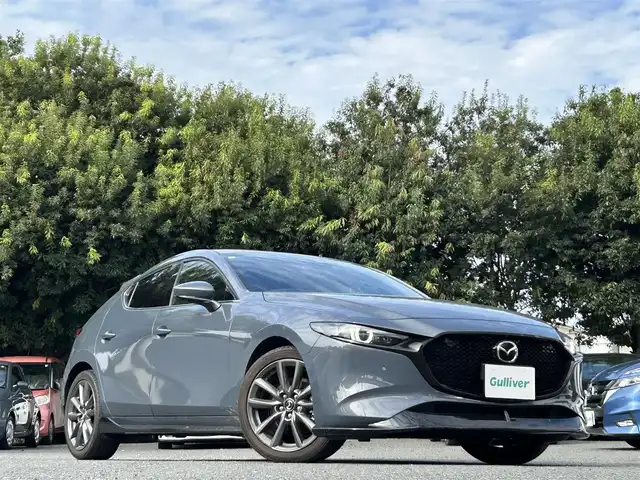 マツダ マツダ３ファストバック 20S プロアクティブ ツーリングS 東京都 2021(令3)年 4.1万km ポリメタルグレーM ワンオーナー/純正SDナビ（8.8インチ）/・Bluetoothオーディオ/USBオーディオ/・Apple CarPlay/AndroidAuto/・フルセグTV/DVD/HDMI/360度セーフティパッケージ/・360度ビューモニター/ドライバーモニタリング/純正エアロ/・フロントアンダースカート/リアルーフスポイラー/・サイドアンダースカート/リアアンダースカート/パワーシート（運転席）/シートヒーター（前席）/レーダークルーズコントロール/クルージングトラフィックサポート/ブラインドスポットモニタリング/純正ビルトインETC/取扱説明書/保証書/スペアキー1本