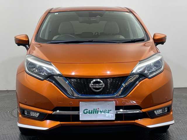 日産 ノート e－パワー メダリスト 愛媛県 2017(平29)年 1.5万km プレミアムコロナオレンジ 純正ナビ/フルセグ／Ｂｌｕｅｔｏｏｔｈ/全方位カメラ/ＥＴＣ/前方ドライブレコーダー/衝突軽減ブレーキ/前後コーナーセンサー/レーンキープアシスト/ＬＥＤヘッドライト/デジタルインナーミラー/合皮シート