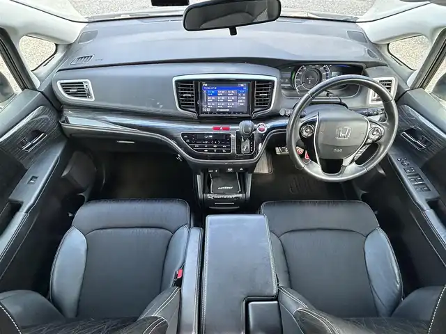 ホンダ オデッセイ ハイブリッド アブソルートセンシングEXパック 愛知県 2016(平28)年 10.5万km ホワイトオーキッドパール 純正8インチディーラーオプションナビ(FM/AM/CD/DVD/USB/BT/iPod/HDMI/フルセグ)/フリップダウンモニター/ホンダセンシング/衝突軽減ブレーキ/路外逸脱抑制機能/アダクティブクルーズコントロール/車両接近通報装置/ブラインドスポットモニター/クリアランスソナー・コーナーセンサー/バックカメラ/ハーフレザー/パワーシート/両側パワースライドドア/ドライブレコーダー/HIDヘッドライト/電動格納ミラー/社外AW18インチ/純正フロアマット/ETC/プッシュスタート/スマートキー・スペアキー１本/ABS/取扱説明書・保証書