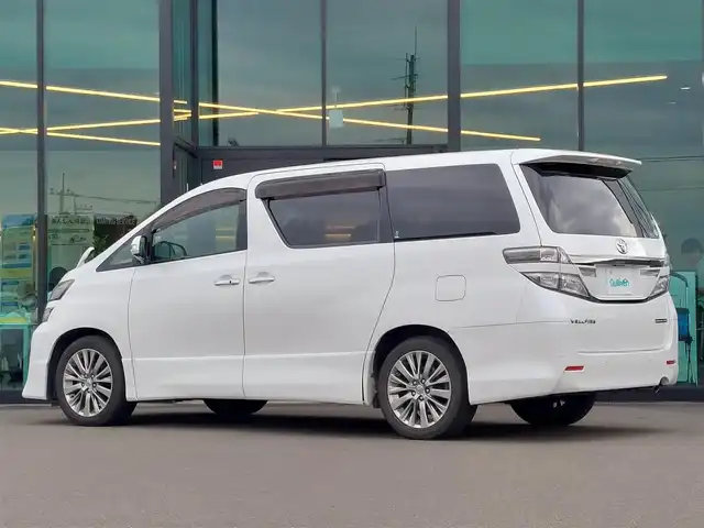 トヨタ ヴェルファイア 2．4Z ゴールデンアイズⅡ 東京都 2014(平26)年 7.6万km ホワイトパールクリスタルシャイン 純正ナビ/フルセグTV/バックカメラ/ETC/100V電源/nanoe/プッシュスタート/MTモード付きAT/クルーズコントロール/コーナーセンサー/両側パワースライドドア/パワーバックドア/ハーフレザーシート/オットマン/HIDヘッドライト/オートライト/ドアバイザー/18インチ純正アルミホイール/スマートキー