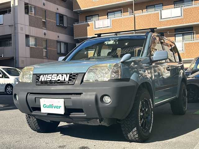 日産 エクストレイル Stt 高知県 2005(平17)年 12万km スレートブルーカーキ ホワイトレタータイヤ/MKWアルミ/SD7型ナビ　MDV-M906HD/（iPod/USB/SD/DISC/BT/ラジオ/フルセグ）/ルーフキャリア/デジタルインナーミラー/ETC/フロアマット/社外ドライブレコーダー/デジタルインナーミラー/ドアバイザー/電動格納ミラー/レザーシート/スマートキー