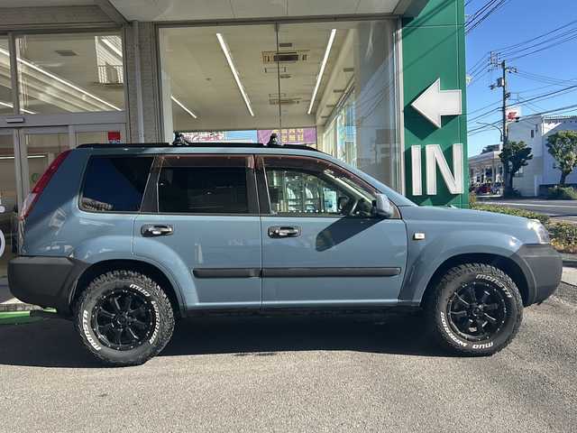 日産 エクストレイル Stt 高知県 2005(平17)年 12万km スレートブルーカーキ ホワイトレタータイヤ/MKWアルミ/SD7型ナビ　MDV-M906HD/（iPod/USB/SD/DISC/BT/ラジオ/フルセグ）/ルーフキャリア/デジタルインナーミラー/ETC/フロアマット/社外ドライブレコーダー/デジタルインナーミラー/ドアバイザー/電動格納ミラー/レザーシート/スマートキー