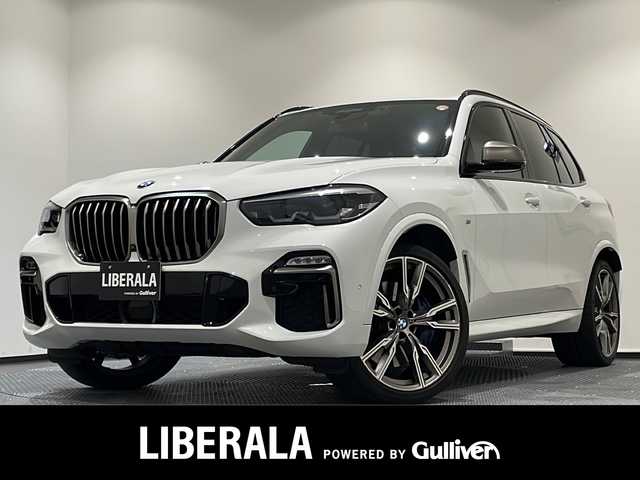 ＢＭＷ Ｘ５ M50i 新潟県 2021(令3)年 2.9万km アルピンホワイトⅢ コンフォートパッケージ/・コンフォート・シート/・マッサージ機能/・フロント・アクティブ・ベンチレーション・シート/22インチ M ライト・アロイ・ホイール Vスポーク・スタイリング/イージークローズ/ BMWライブ・コックピット/HDDナビゲーションシステム/・TV/BT/Apple CarPlay/ヘッドアップディスプレイ/ドライビング・アシスト/・アクティブ・クルーズ・コントロール/・トラフィック・サイン・アシスト/・レーン・ディパーチャー・ウォーニング/・レーン・チェンジ・ウォーニング/・DHC/ASC/DTC/CBC/DBC/ABS/HDC/パーキングアシストプラス/・パーク・ディスタンス・コントロール/・パーキング・アシスト/・パノラマ・サイド・ビュー・カメラ/アンビエントライト/ワイヤレス・チャージング/4ゾーン・オートマチック・エア・コンディショナー/パワーシート/シートヒーター/ETC2.0/ドライブレコーダー