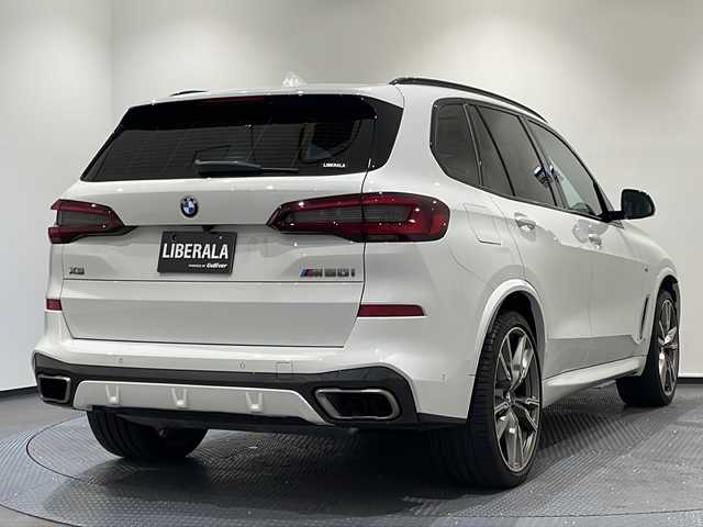 ＢＭＷ Ｘ５ M50i 新潟県 2021(令3)年 2.9万km アルピンホワイトⅢ コンフォートパッケージ/・コンフォート・シート/・マッサージ機能/・フロント・アクティブ・ベンチレーション・シート/22インチ M ライト・アロイ・ホイール Vスポーク・スタイリング/イージークローズ/ BMWライブ・コックピット/HDDナビゲーションシステム/・TV/BT/Apple CarPlay/ヘッドアップディスプレイ/ドライビング・アシスト/・アクティブ・クルーズ・コントロール/・トラフィック・サイン・アシスト/・レーン・ディパーチャー・ウォーニング/・レーン・チェンジ・ウォーニング/・DHC/ASC/DTC/CBC/DBC/ABS/HDC/パーキングアシストプラス/・パーク・ディスタンス・コントロール/・パーキング・アシスト/・パノラマ・サイド・ビュー・カメラ/アンビエントライト/ワイヤレス・チャージング/4ゾーン・オートマチック・エア・コンディショナー/パワーシート/シートヒーター/ETC2.0/ドライブレコーダー