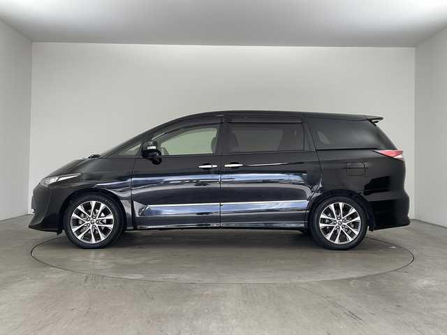 トヨタ エスティマ アエラス プレミアム 兵庫県 2016(平28)年 6.1万km ブラック ・純正9インチナビ/Bluetooth/CD/DVD/SD/TV/・バックカメラ/・トヨタセーフティセンス/・プリクラッシュセーフティ/・レーンディパーチャーアラート/・オートマチックハイビーム /・先行車発進告知機能/・車両接近通報装置/・緊急ブレーキシグナル/・クルーズコントロール/・MTモード付AT/・両側パワースライドドア/・ファブリック＋合成皮革シート/・純正フロアマット/・LEDヘッドライト/・純正アルミホイールタイヤ/・ビルトインETC/・電動格納ミラー/・スマートキー