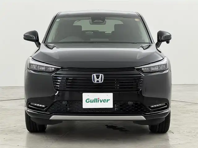 ホンダ ヴェゼル ハイブリッド e:HEV Z 福岡県 2025(令7)年 0.1千km クリスタルブラックパール 登録済未使用車　/純正９型ＤＡナビ　/バックカメラ　/置くだけ充電　/アダプティブクルコン　/コーナーセンサー　/衝突軽減ブレーキ　/レーンキープ　/ＢＳＭ　/アクセル踏み間違い防止　/ヒルディセントコントロール　/ＭＴモード付き　/パワーバックドア　/ハーフレザーシート　/シートヒーター　/ＬＥＤヘッドライト