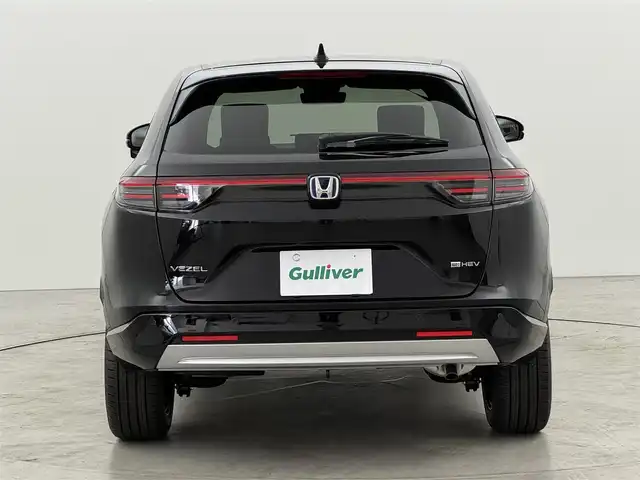 ホンダ ヴェゼル ハイブリッド e:HEV Z 福岡県 2025(令7)年 0.1千km クリスタルブラックパール 登録済未使用車　/純正９型ＤＡナビ　/バックカメラ　/置くだけ充電　/アダプティブクルコン　/コーナーセンサー　/衝突軽減ブレーキ　/レーンキープ　/ＢＳＭ　/アクセル踏み間違い防止　/ヒルディセントコントロール　/ＭＴモード付き　/パワーバックドア　/ハーフレザーシート　/シートヒーター　/ＬＥＤヘッドライト