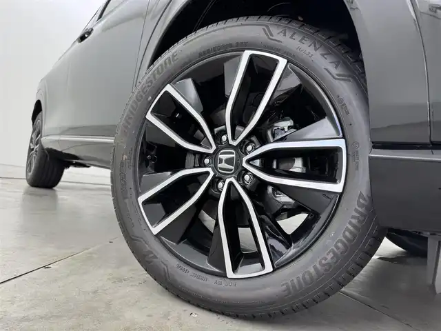 ホンダ ヴェゼル ハイブリッド e:HEV Z 福岡県 2025(令7)年 0.1千km クリスタルブラックパール 登録済未使用車　/純正９型ＤＡナビ　/バックカメラ　/置くだけ充電　/アダプティブクルコン　/コーナーセンサー　/衝突軽減ブレーキ　/レーンキープ　/ＢＳＭ　/アクセル踏み間違い防止　/ヒルディセントコントロール　/ＭＴモード付き　/パワーバックドア　/ハーフレザーシート　/シートヒーター　/ＬＥＤヘッドライト
