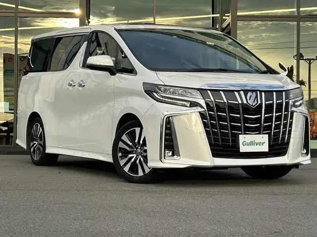 トヨタ アルファード S Cパッケージ 愛媛県 2022(令4)年 3.5万km ホワイトパールクリスタルシャイン 純正ディスプレイオーディオ（Bluetooth/SD/フルセグテレビ）/DVDデッキ/純正フリップダウンモニター/ETC/サンルーフ/バックカメラ/前後ドライブレコーダー/両側電動スライドドア/シートヒーター/エアシート/ステアリングヒーター/オットマン/電動リアゲート/パワーシート/シートメモリー/純正フロアマット/純正18インチアルミホイール/追従型クルーズコントロール/ABS/横滑り防止装置/前後コーナーセンサー/レーンキープアシスト/盗難防止装置/衝突被害軽減システム/オートライト/オートマチックハイビーム/LEDヘッドライト