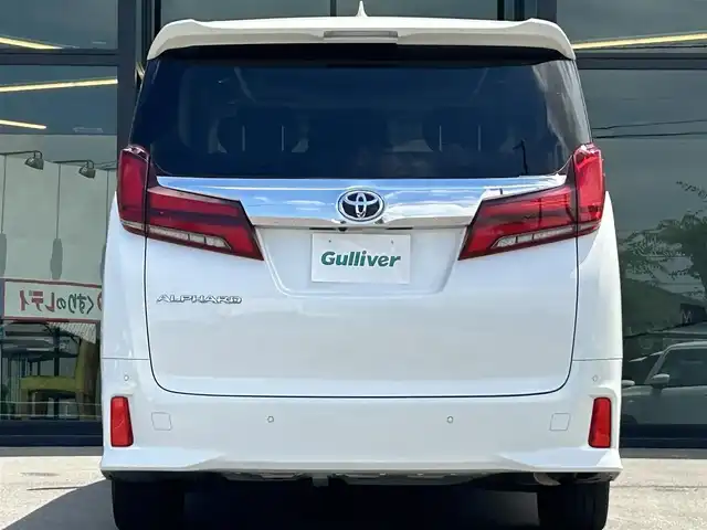 トヨタ アルファード S Cパッケージ 愛媛県 2022(令4)年 3.5万km ホワイトパールクリスタルシャイン 純正ディスプレイオーディオ（Bluetooth/SD/フルセグテレビ）/DVDデッキ/純正フリップダウンモニター/ETC/サンルーフ/バックカメラ/前後ドライブレコーダー/両側電動スライドドア/シートヒーター/エアシート/ステアリングヒーター/オットマン/電動リアゲート/パワーシート/シートメモリー/純正フロアマット/純正18インチアルミホイール/追従型クルーズコントロール/ABS/横滑り防止装置/前後コーナーセンサー/レーンキープアシスト/盗難防止装置/衝突被害軽減システム/オートライト/オートマチックハイビーム/LEDヘッドライト