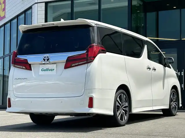 トヨタ アルファード S Cパッケージ 愛媛県 2022(令4)年 3.5万km ホワイトパールクリスタルシャイン 純正ディスプレイオーディオ（Bluetooth/SD/フルセグテレビ）/DVDデッキ/純正フリップダウンモニター/ETC/サンルーフ/バックカメラ/前後ドライブレコーダー/両側電動スライドドア/シートヒーター/エアシート/ステアリングヒーター/オットマン/電動リアゲート/パワーシート/シートメモリー/純正フロアマット/純正18インチアルミホイール/追従型クルーズコントロール/ABS/横滑り防止装置/前後コーナーセンサー/レーンキープアシスト/盗難防止装置/衝突被害軽減システム/オートライト/オートマチックハイビーム/LEDヘッドライト