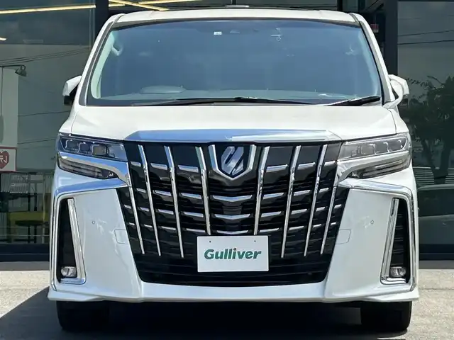 トヨタ アルファード S Cパッケージ 愛媛県 2022(令4)年 3.5万km ホワイトパールクリスタルシャイン 純正ディスプレイオーディオ（Bluetooth/SD/フルセグテレビ）/DVDデッキ/純正フリップダウンモニター/ETC/サンルーフ/バックカメラ/前後ドライブレコーダー/両側電動スライドドア/シートヒーター/エアシート/ステアリングヒーター/オットマン/電動リアゲート/パワーシート/シートメモリー/純正フロアマット/純正18インチアルミホイール/追従型クルーズコントロール/ABS/横滑り防止装置/前後コーナーセンサー/レーンキープアシスト/盗難防止装置/衝突被害軽減システム/オートライト/オートマチックハイビーム/LEDヘッドライト