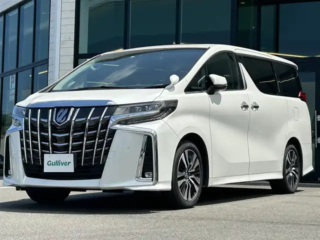 トヨタ アルファード S Cパッケージ 愛媛県 2022(令4)年 3.5万km ホワイトパールクリスタルシャイン 純正ディスプレイオーディオ（Bluetooth/SD/フルセグテレビ）/DVDデッキ/純正フリップダウンモニター/ETC/サンルーフ/バックカメラ/前後ドライブレコーダー/両側電動スライドドア/シートヒーター/エアシート/ステアリングヒーター/オットマン/電動リアゲート/パワーシート/シートメモリー/純正フロアマット/純正18インチアルミホイール/追従型クルーズコントロール/ABS/横滑り防止装置/前後コーナーセンサー/レーンキープアシスト/盗難防止装置/衝突被害軽減システム/オートライト/オートマチックハイビーム/LEDヘッドライト