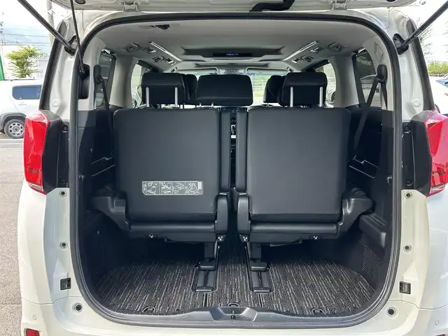 トヨタ アルファード S Cパッケージ 愛媛県 2022(令4)年 3.5万km ホワイトパールクリスタルシャイン 純正ディスプレイオーディオ（Bluetooth/SD/フルセグテレビ）/DVDデッキ/純正フリップダウンモニター/ETC/サンルーフ/バックカメラ/前後ドライブレコーダー/両側電動スライドドア/シートヒーター/エアシート/ステアリングヒーター/オットマン/電動リアゲート/パワーシート/シートメモリー/純正フロアマット/純正18インチアルミホイール/追従型クルーズコントロール/ABS/横滑り防止装置/前後コーナーセンサー/レーンキープアシスト/盗難防止装置/衝突被害軽減システム/オートライト/オートマチックハイビーム/LEDヘッドライト