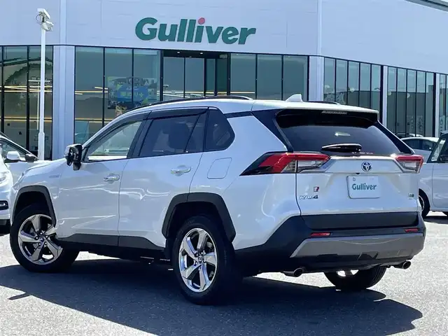 トヨタ ＲＡＶ４ ハイブリッドG 島根県 2019(令1)年 7.4万km ホワイトパールクリスタルシャイン 登録時走行距離73545km/純正SDナビ【CD/DVD/Bluetooth/HDMI】/フルセグテレビ/衝突軽減ブレーキ/追従クルーズコントロール/電動リアゲート/レザーシート/シートヒーター/ハンドルヒーター/パワーシート/ルーフレール/コーナーセンサー/LEDライト/オートハイビーム/ETC/純正18インチAW
