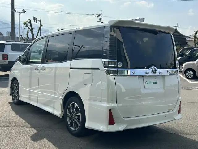トヨタ ヴォクシー ZS 煌Ⅲ 愛媛県 2020(令2)年 4.8万km ホワイトパールクリスタルシャイン 純正メモリナビ（Bluetooth/バックカメラ/フルセグテレビ/HDMI/WiFi）/ビルトインETC/前後ドライブレコーダー/前後コーナーセンサー/両側パワースライドドア/クルーズコントロール/USB入力端子/純正16インチAW/純正フロアマット/衝突被害軽減システム/レーンキープアシスト/横滑り防止装置/盗難防止装置/カーテンエアバック/LEDヘッドライト/フォグランプ