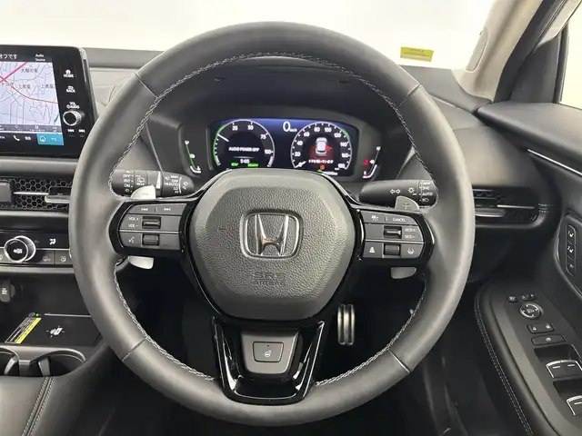 ホンダ ＺＲ－Ｖ ハイブリッド e:HEV Z 埼玉県 2024(令6)年 0.4万km プラチナホワイトパール 純正ナビ/(Bluetooth/USB/AM/FM)/地デジフルセグ/バックカメラ/アラウンドビューモニター/ETC2.0/Honda SENSING/・衝突軽減ブレーキ/・先行車発進お知らせ機能/・路外逸脱抑制機能/・標識認識機能/・渋滞追従機能付アダプティブクルーズコントロール/・車線維持支援システム/・ブラインドスポットインフォメーション/・オートハイビーム/BOSEプレミアムサウンドシステム/ハンズフリーアクセスパワーテールゲート/パドルシフト/前席シートヒーター/置くだけ充電/ダウンヒルアシストコントロール/ドライブモードセレクト/電子パーキングシステム/ブレーキホールド/パワーバックドア/純正フロアマット/純正18インチアルミホイール