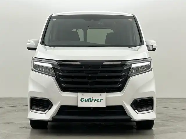 ホンダ ステップワゴン スパーダ ハイブリッド G EX ホンダセンシング 福岡県 2019(平31)年 7.6万km プラチナホワイトパール ワンオーナー　/アルパインフリップダウン　/アルパインナビ　/Ｆ，Ｂカメラ　/ＥＴＣ　/前方ドラレコ　/レーダー探知機　/ＡＣＣ　/衝突軽減ブレーキ　/レーンキープ　/両側電動スライドドア　/ハーフレザー　/シートヒーター/わくわくゲート