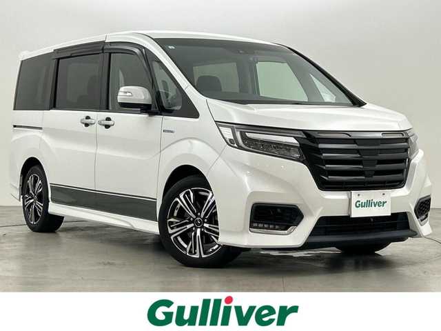 ホンダ ステップワゴン スパーダ ハイブリッド G EX ホンダセンシング 福岡県 2019(平31)年 7.6万km プラチナホワイトパール ワンオーナー　/アルパインフリップダウン　/アルパインナビ　/Ｆ，Ｂカメラ　/ＥＴＣ　/前方ドラレコ　/レーダー探知機　/ＡＣＣ　/衝突軽減ブレーキ　/レーンキープ　/両側電動スライドドア　/ハーフレザー　/シートヒーター/わくわくゲート