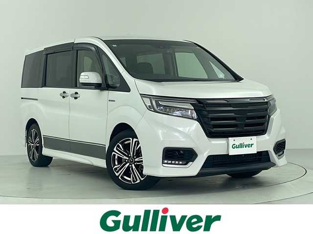 ホンダ ステップワゴン スパーダ ハイブリッド G EX ホンダセンシング 大阪府 2019(平31)年 7.6万km プラチナホワイトパール ワンオーナー　/アルパインフリップダウン　/アルパインナビ　/Ｆ，Ｂカメラ　/ＥＴＣ　/前方ドラレコ　/レーダー探知機　/ＡＣＣ　/衝突軽減ブレーキ　/レーンキープ　/両側電動スライドドア　/ハーフレザー　/シートヒーター/わくわくゲート