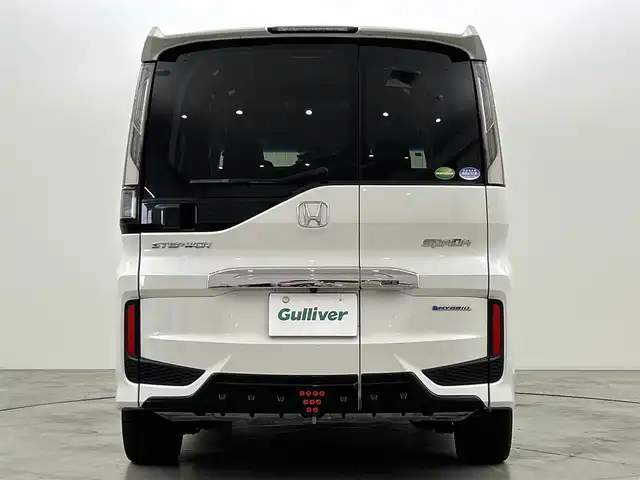 ホンダ ステップワゴン スパーダ ハイブリッド G EX ホンダセンシング 福岡県 2019(平31)年 7.6万km プラチナホワイトパール ワンオーナー　/アルパインフリップダウン　/アルパインナビ　/Ｆ，Ｂカメラ　/ＥＴＣ　/前方ドラレコ　/レーダー探知機　/ＡＣＣ　/衝突軽減ブレーキ　/レーンキープ　/両側電動スライドドア　/ハーフレザー　/シートヒーター/わくわくゲート