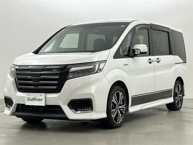 ホンダ ステップワゴン スパーダ ハイブリッド G EX ホンダセンシング 福岡県 2019(平31)年 7.6万km プラチナホワイトパール ワンオーナー　/アルパインフリップダウン　/アルパインナビ　/Ｆ，Ｂカメラ　/ＥＴＣ　/前方ドラレコ　/レーダー探知機　/ＡＣＣ　/衝突軽減ブレーキ　/レーンキープ　/両側電動スライドドア　/ハーフレザー　/シートヒーター/わくわくゲート