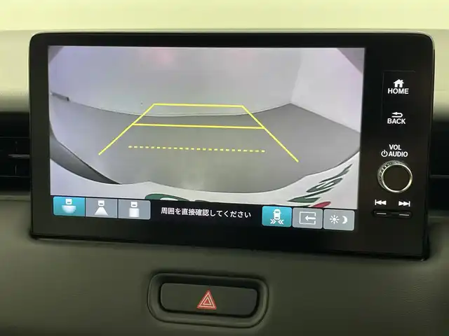 ホンダ ヴェゼル ハイブリッド e:HEV Z 熊本県 2025(令7)年 0.1千km クリスタルブラックパール 登録済未使用車/純正ナビ（ＡｐｐｌＣａｒＰｌａｙ・ＡｎｄｒｏｉｄＡｕｔｏ・ＢＴ）/バックカメラ　/ビルトインＥＴＣ2.0/ホンダセンシング/・レーダークルーズコントロール　/・衝突軽減ブレーキ/・誤発進制御機能/・路外逸脱制御機能/・車線維持支援システム/・先行車発進お知らせ機能/・標識認識機能/・オートハイビーム/・ブラインドスポットモニター/横滑り防止/前席シートヒーター　/ステアリングヒーター　/パワーバックドア/置くだけ充電/純正１８インチAW/オートライト/オートマチックハイビーム/フォグライト/スマートキー/スペアキー1本/保証書/取扱説明書