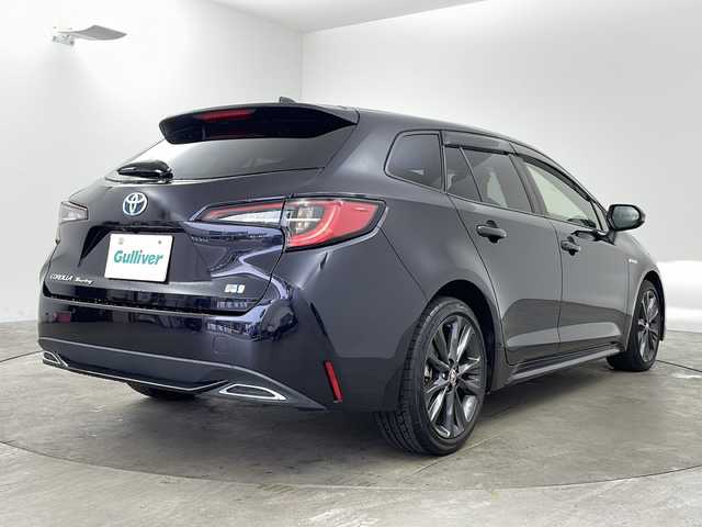 トヨタ カローラツーリング ハイブリッド ダブルバイビー 兵庫県 2019(令1)年 2.8万km スパークリングブラックパールクリスタルシャイン ・純正9インチディスプレイナビオーディオ&TV&BT&USB&Miracast/・バックカメラ/・トヨタセーフティーセンス/・プリクラッシュセーフティ/・レーントレーシングアシスト［LTA］/・レーンディパーチャーアラート［LDA］/・レーダークルーズコントロール/・オートマチックハイビーム［AHB］/・ロードサインアシスト［RSA］ /・インテリジェントクリアランスソナー/・ブラインドスポットモニター［BSM］ /・リヤクロストラフィックアラート［RCTA］/・パーキングサポートブレーキ［PKSB］/・先行車発進告知/・オートマチックハイビーム/・レーダークルーズコントロール/・純正フロアマット/・ハーフレザーシート/・純正17インチアルミホイール/・ドアミラーヒーター/・LEDオートライト/・LEDフォグランプ/・前後ドライブレコーダー/・ETC/・スマートキー