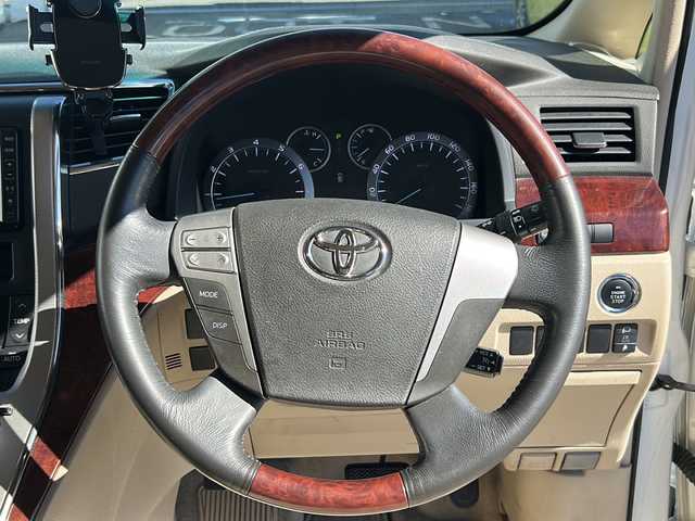 トヨタ アルファード 240G 愛知県 2008(平20)年 9.7万km ホワイトパールクリスタルシャイン 1オーナー/両側パワスラ/純正フリップダウンモニター/クルーズコントロール/ディーラーナビ/TV/バックカメラ/前席パワーシート/メモリーシート/スタッドレスＴ（社外ＡＷ付）積載/ステアリモコン　/ウィンカーミラー/保証書/取扱説明書/記録簿