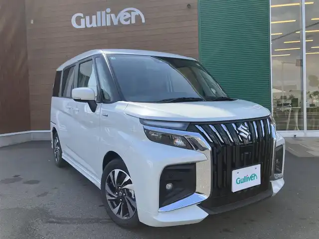 スズキ ソリオ バンディット HV MV 埼玉県 2025(令7)年 0.1万km ピュアホワイトP 登録時111km/ワンオーナー/両側パワースライドドア/スズキセーフティサポート/デュアルセンサーブレーキサポート2/アダプティブクルーズコントロール/　・全車速追随機能・停止保持機能付き/電動パーキングブレーキ/アイドリングストップ/パーキングセンサー/ブラインドスポットモニター/ヘッドアップディスプレイ/LEDヘッドライト/LEDフォグ/ハイビームアシスト/革巻きステアリング/運転席・助手席シートヒーター/プッシュスタートボタン/スマートキー2個/純正15インチAW/保証書・取扱説明書/
