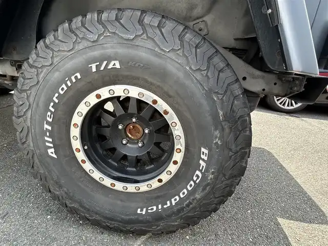 クライスラー・ジープ ジープ ラングラー スポーツ 愛知県 2004(平16)年 4.7万km 紺 社外オーディオ/Apple Car Play/Bluetooth/ETC/All-Terrainタイヤ/社外アルミホイール/社外LEDヘッドライト/純正ヘッドライト有/純正フロントバンパー有