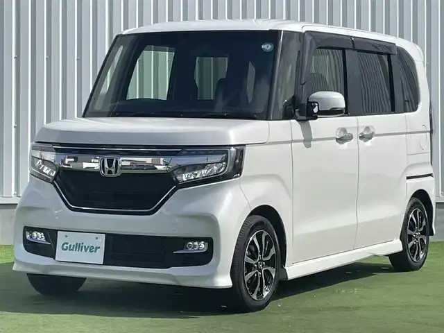 ホンダ Ｎ ＢＯＸ カスタム G L ホンダセンシング 香川県 2020(令2)年 4.2万km プラチナホワイトパール 純正メモリーナビ/→AM/FM/CD/DVD/Bluetooth/フルセグTV/ホンダセンシング/レーダークルーズコントロール/レーンキープアシスト/ビルトインETC/バックカメラ/前方ドライブレコーダー/シートヒーター/両側パワースライドドア/LEDヘッドライト/アイドリングストップ/サンシェード/プッシュスタート/スマートキー/純正14インチアルミホイール/純正フロアマット/ステアリングスイッチ