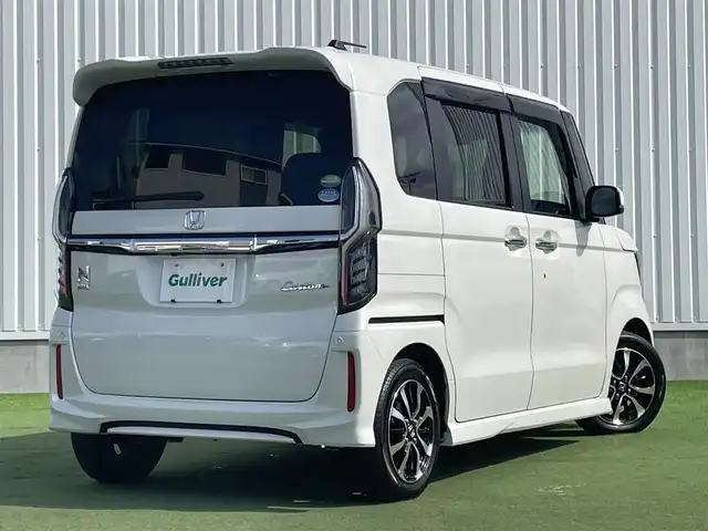 ホンダ Ｎ ＢＯＸ カスタム G L ホンダセンシング 香川県 2020(令2)年 4.2万km プラチナホワイトパール 純正メモリーナビ/→AM/FM/CD/DVD/Bluetooth/フルセグTV/ホンダセンシング/レーダークルーズコントロール/レーンキープアシスト/ビルトインETC/バックカメラ/前方ドライブレコーダー/シートヒーター/両側パワースライドドア/LEDヘッドライト/アイドリングストップ/サンシェード/プッシュスタート/スマートキー/純正14インチアルミホイール/純正フロアマット/ステアリングスイッチ