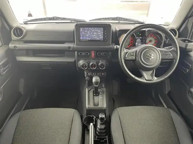 スズキ ジムニー XC 熊本県 2023(令5)年 5.3万km ミディアムグレー 社外メモリナビ(CD/DVD/BT/フルセグ)/2/4WD切り替え/デュアルブレーキサポート/衝突被害軽減ブレーキ/車線逸脱警告/バックカメラ/クルーズコントロール/スロットルコントローラー/前後ドライブレコーダー/前席シートヒーター/アイドリングストップ/オートライト/LEDヘッドライト/純正ゴムフロアマット/LED室内灯/取扱説明書/保証書