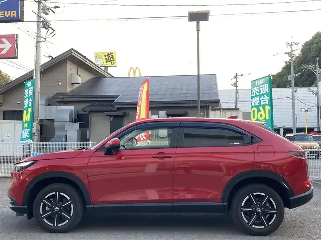 ホンダ ヴェゼル ハイブリッド e:HEV X 長崎県 2022(令4)年 2.1万km プレミアムクリスタルレッドM ホンダセンシング/・衝突被害軽減ブレーキ/・レーダークルーズコントロール/・レーンキープアシスト/Honda CONNECTディスプレー/・ナビ/・Bluetooth接続/・フルセグTV/・スマートフォン連携/バックカメラ/ビルトインETC2.0/ワイヤレス充電/ステアリングスイッチ/パドルシフト/電子パーキング/オートホールド機能/ダウンヒルアシスト/コーナーセンサー/横すべり防止装置/ISOFIX/ドライブレコーダー