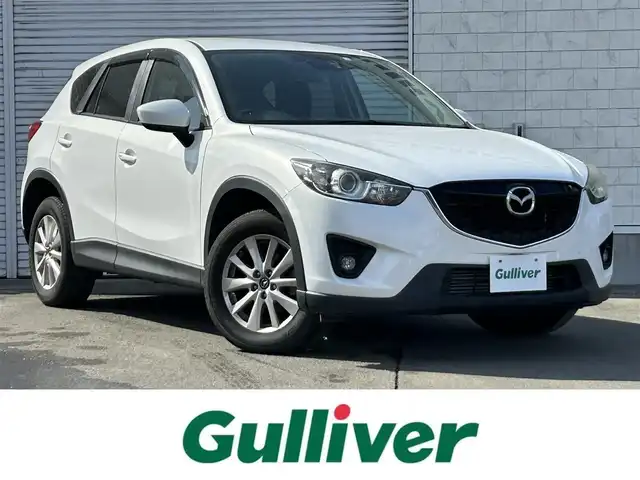 マツダ ＣＸ－５ XD 道東・釧路十勝 2014(平26)年 5.8万km クリスタルホワイトパールマイカ 4WD/純正ナビ/(FM AM CD DVD BT TV)/バックカメラ/クルーズコントロール/ETC/衝突軽減ブレーキ/HID/サイドカメラ/プッシュスタート/スマートキー/純正フロアマット/ドアバイザー/革巻きステアリング/ウィンカーミラー/オートライト