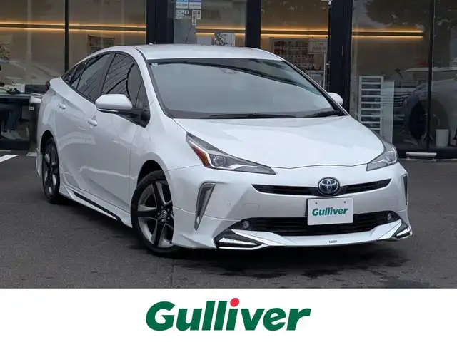 トヨタ プリウス Sツーリングセレクション 福井県 2022(令4)年 3.4万km プラチナホワイトパールマイカ モデリスタフルエアロ/前後ドライブレコーダー/アルパインデジタルインナーミラー/アルパイン9インチナビ/（CD/DVD/Bluetooth/フルセグ）/バックカメラ/全席レザーシート/運転席・助手席シートヒーター/TOYOTA　Safety Sence/・プリクラッシュセーフティ/・レーントレーシングアシスト/・オートマチックハイビーム/・ロードサインアシスト/・レーダークルーズコントロール (全車速追従機能付き)/・先行車発進告知機能/・プロアクティブドライビングアシスト/ETC/オートLEDライト/純正フロアマット/新車保証書/取扱説明書