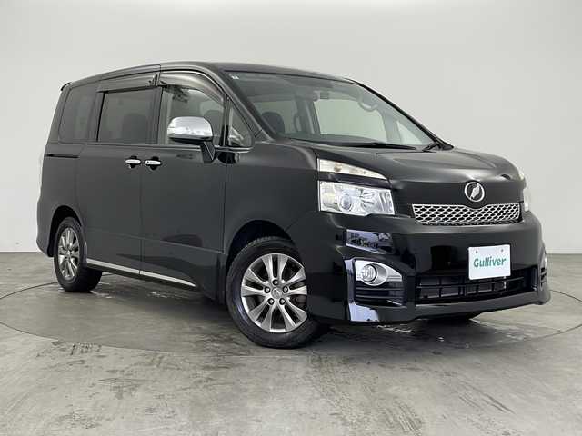 トヨタ ヴォクシー ZS 煌Ⅱ 兵庫県 2012(平24)年 7.9万km ブラック ・純正ナビ/CD/DVD/SD/BT/HDD/TV/・バックカメラ/・ビルトインETC/・両側パワースライドドア/・社外前後ドライブレコーダー/・ステアリングスイッチ/・HIDライト/・パドルシフト/・プッシュスタート/・プラズマクラスター/・スマートキー/・純正16インチアルミホイール/・純正フロアマット