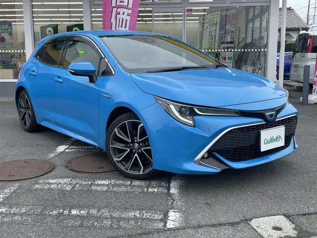 トヨタ カローラ スポーツ ハイブリッドG Z 神奈川県 2019(令1)年 12.8万km シアンM ワンオーナー/トヨタセーフティセンス/・衝突軽減ブレーキ/・レーダークルーズコントロール/・ブラインドスポットモニター/・コーナーセンサー/ヘッドアップディスプレイ/ステアリングスイッチ/バックカメラ/ビルトインETC2.0/プッシュスタート/スマートキーx2/LEDヘッドライト/フォグライト/純正18インチアルミホイール/4:2:4分割アジャスタブルデッキボード/保証書/ナビ取説/取説