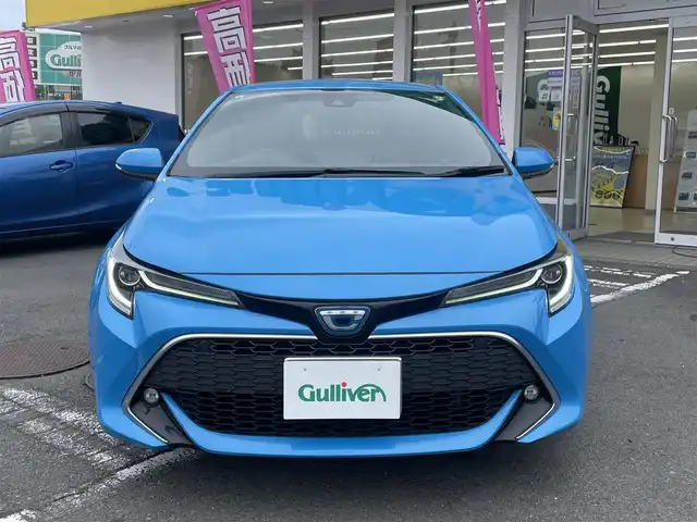 トヨタ カローラ スポーツ ハイブリッドG Z 神奈川県 2019(令1)年 12.8万km シアンM ワンオーナー/トヨタセーフティセンス/・衝突軽減ブレーキ/・レーダークルーズコントロール/・ブラインドスポットモニター/・コーナーセンサー/ヘッドアップディスプレイ/ステアリングスイッチ/バックカメラ/ビルトインETC2.0/プッシュスタート/スマートキーx2/LEDヘッドライト/フォグライト/純正18インチアルミホイール/4:2:4分割アジャスタブルデッキボード/保証書/ナビ取説/取説