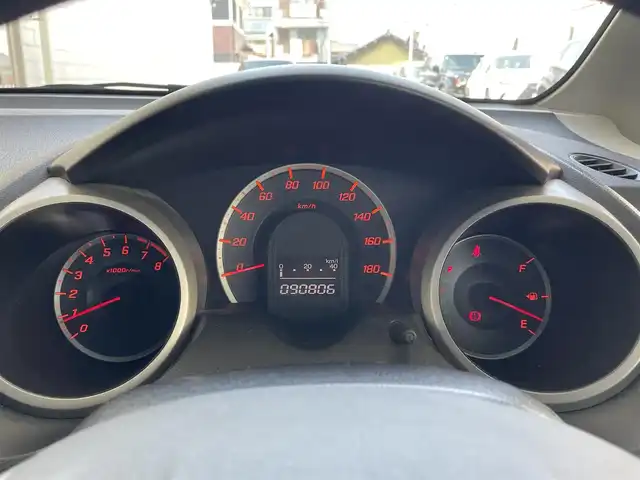 ホンダ フィット L ハイウェイ エディション 愛知県 2009(平21)年 9.1万km プレミアムホワイトパール ワンオーナー/純正HDDインターナビ〈MOP〉/・ワンセグTV/CD/DVD/バックカメラ/ビルトインETC/オートエアコン/オートライト機能付HIDヘッドライト/運転席アームレスト＆シートリフター/前方ドライブレコーダー（ZDR-012）