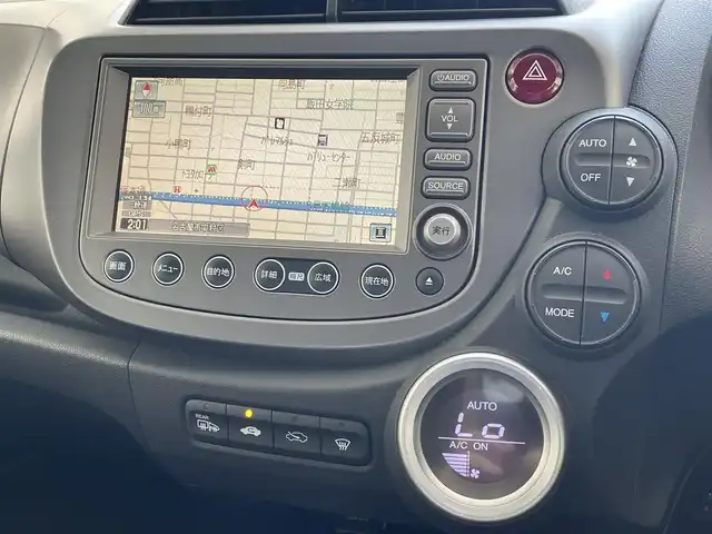 ホンダ フィット L ハイウェイ エディション 愛知県 2009(平21)年 9.1万km プレミアムホワイトパール ワンオーナー/純正HDDインターナビ〈MOP〉/・ワンセグTV/CD/DVD/バックカメラ/ビルトインETC/オートエアコン/オートライト機能付HIDヘッドライト/運転席アームレスト＆シートリフター/前方ドライブレコーダー（ZDR-012）