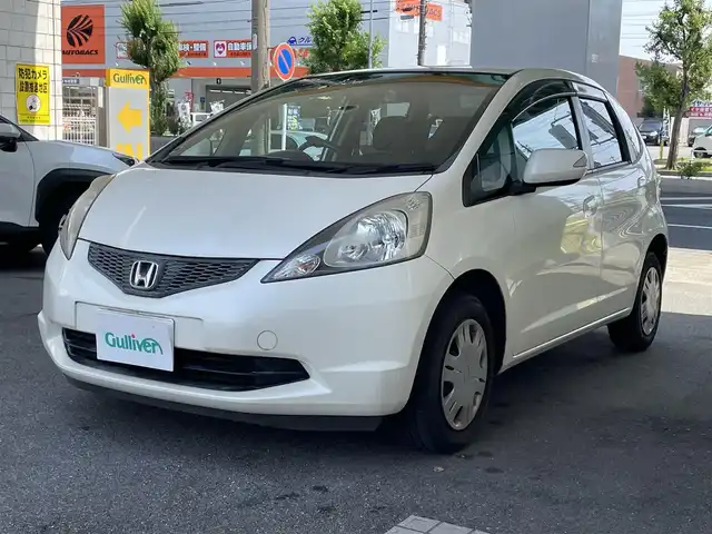 ホンダ フィット L ハイウェイ エディション 愛知県 2009(平21)年 9.1万km プレミアムホワイトパール ワンオーナー/純正HDDインターナビ〈MOP〉/・ワンセグTV/CD/DVD/バックカメラ/ビルトインETC/オートエアコン/オートライト機能付HIDヘッドライト/運転席アームレスト＆シートリフター/前方ドライブレコーダー（ZDR-012）