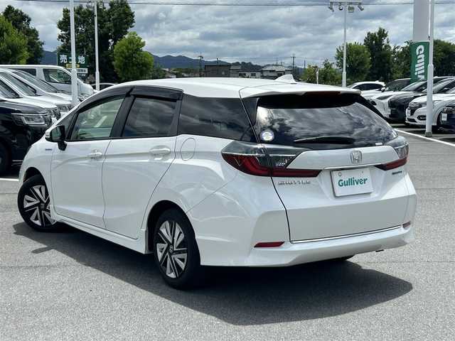 ホンダ シャトル ハイブリッド X ホンダセンシング 奈良県 2019(令1)年 3.2万km プラチナホワイトパール フルセグナビ（ＶＸＭー１９４ＶＦｉ）　/Ｂｌｕｅｔｏｏｔｈ　/ＣＤ／ＤＶＤ　/バックカメラ　/スペアキー　/ハーフレザーシート　/シートヒーター　/ドライブレコーダー　/純正フロアマット　/レーダークルーズコントロール