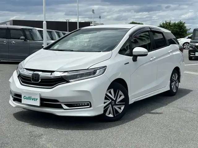 ホンダ シャトル ハイブリッド X ホンダセンシング 奈良県 2019(令1)年 3.2万km プラチナホワイトパール フルセグナビ（ＶＸＭー１９４ＶＦｉ）　/Ｂｌｕｅｔｏｏｔｈ　/ＣＤ／ＤＶＤ　/バックカメラ　/スペアキー　/ハーフレザーシート　/シートヒーター　/ドライブレコーダー　/純正フロアマット　/レーダークルーズコントロール
