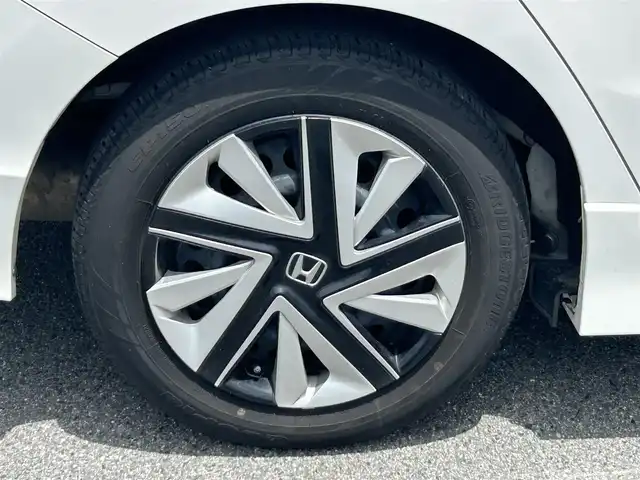 ホンダ シャトル ハイブリッド X ホンダセンシング 奈良県 2019(令1)年 3.2万km プラチナホワイトパール フルセグナビ（ＶＸＭー１９４ＶＦｉ）　/Ｂｌｕｅｔｏｏｔｈ　/ＣＤ／ＤＶＤ　/バックカメラ　/スペアキー　/ハーフレザーシート　/シートヒーター　/ドライブレコーダー　/純正フロアマット　/レーダークルーズコントロール