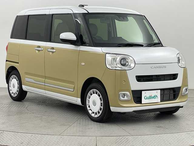 ダイハツ ムーヴ キャンバス ストライプス G 新潟県 2022(令4)年 0.1千km シャイニングホワイトパール/サンドベージュメタリック スマートアシスト/ホッとドリンクホルダー/純正メモリナビ/　CD/DVD/フルセグTV/Bluetooth/バックカメラ/両側パワースライドドア/LEDオートライト/シートヒーター/ステアリングリモコン/電格ミラー/スマートキー